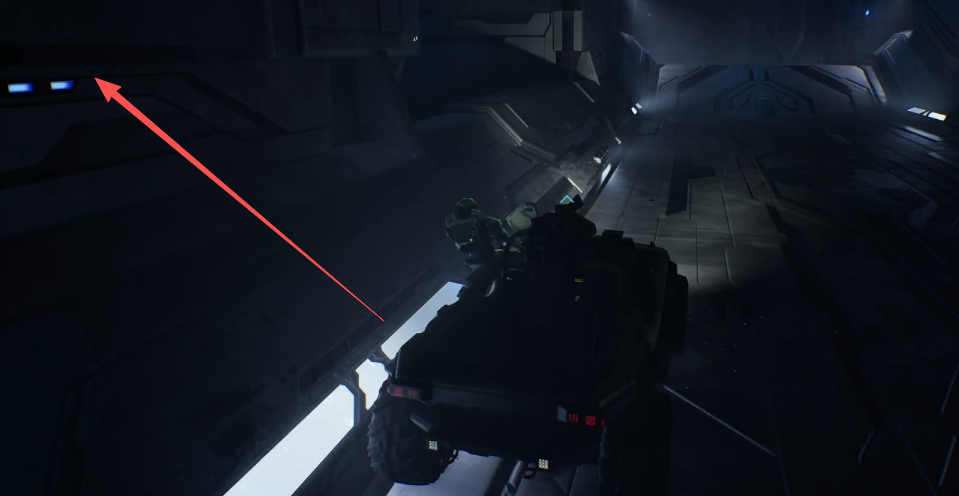 Arrow showing the climb over the metal half-wall to the suspended ledge