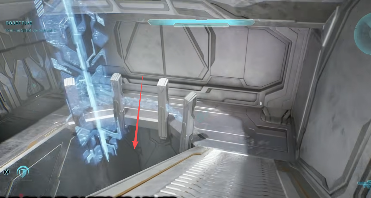 Arrow pointing down from the winding ramp in the blue holographic shaft